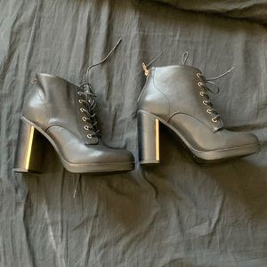 TORRID HEELED LEATHER BOOTS